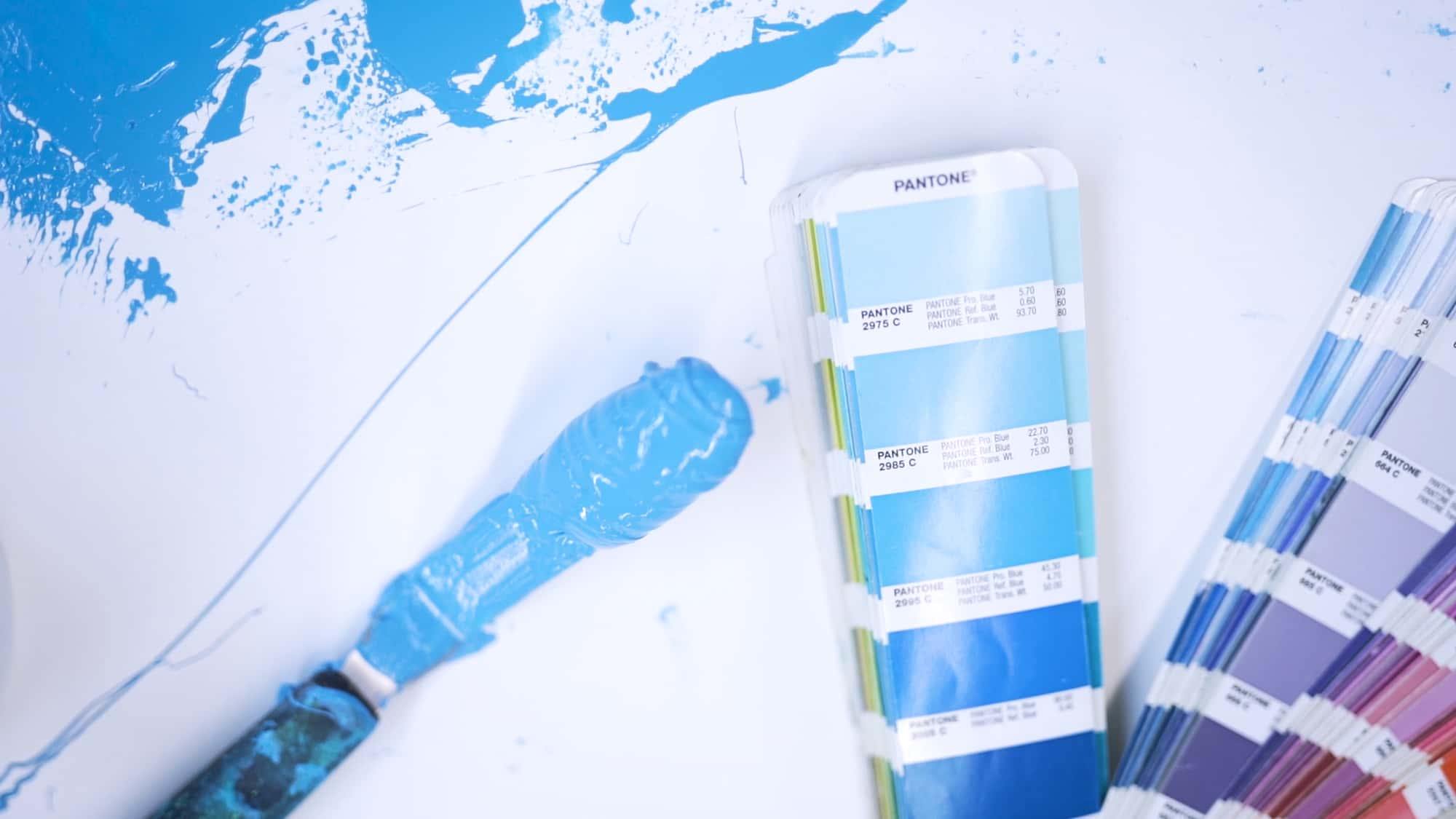 Screen printing ink compared to a matching color swatch.