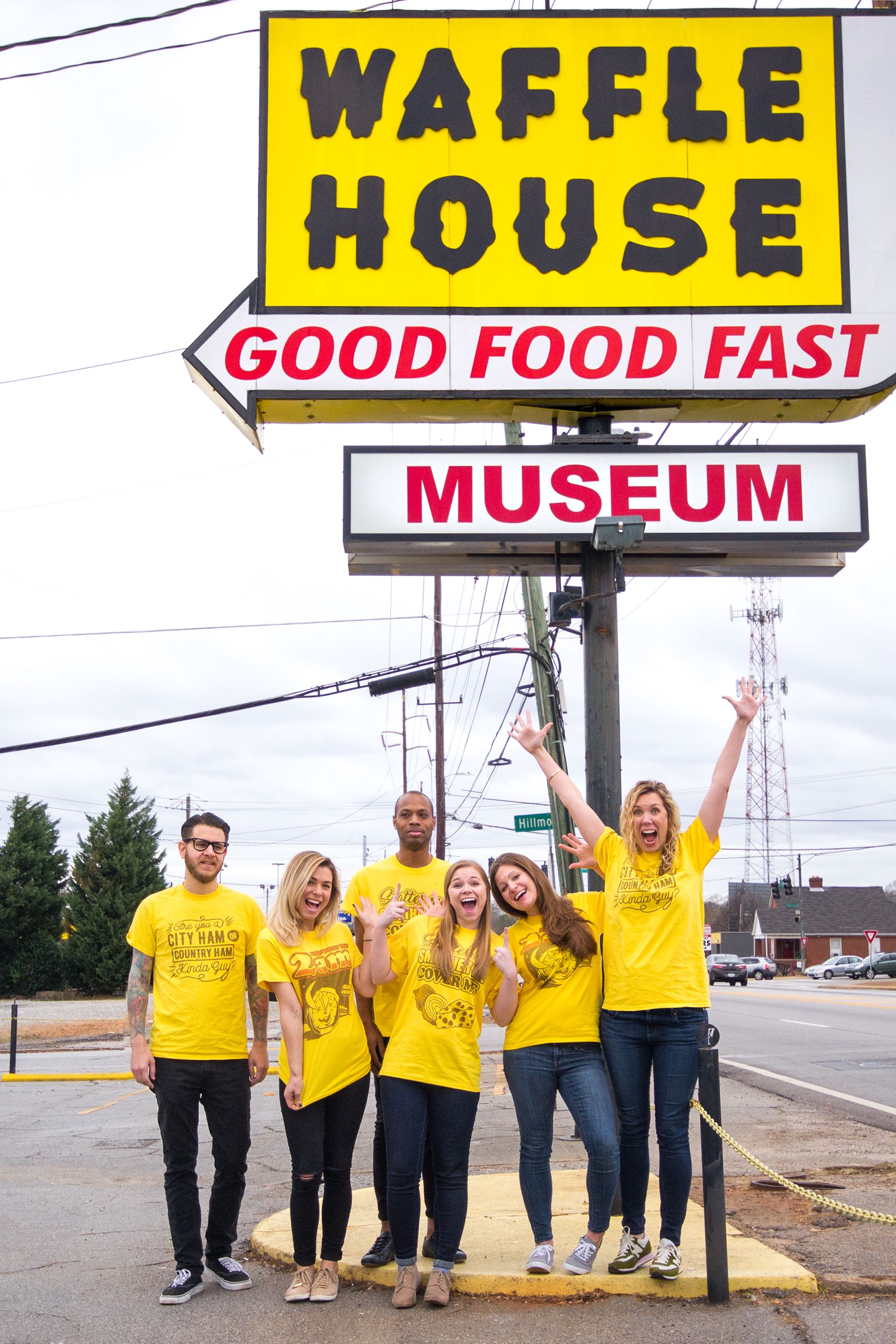 The UberPrints crew posing in front of the Waffle House sign.