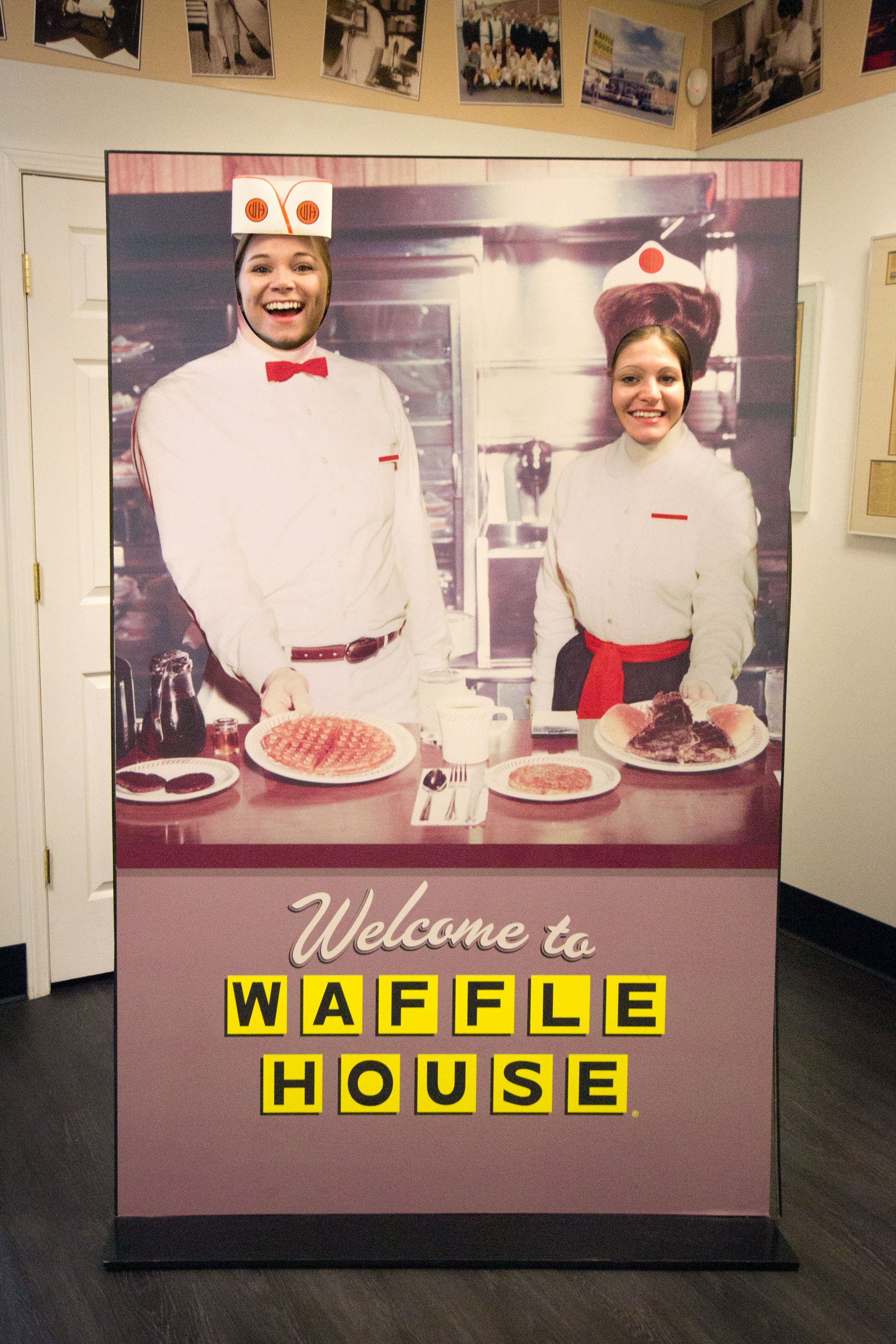 Posing with the Waffle House novelty sign.