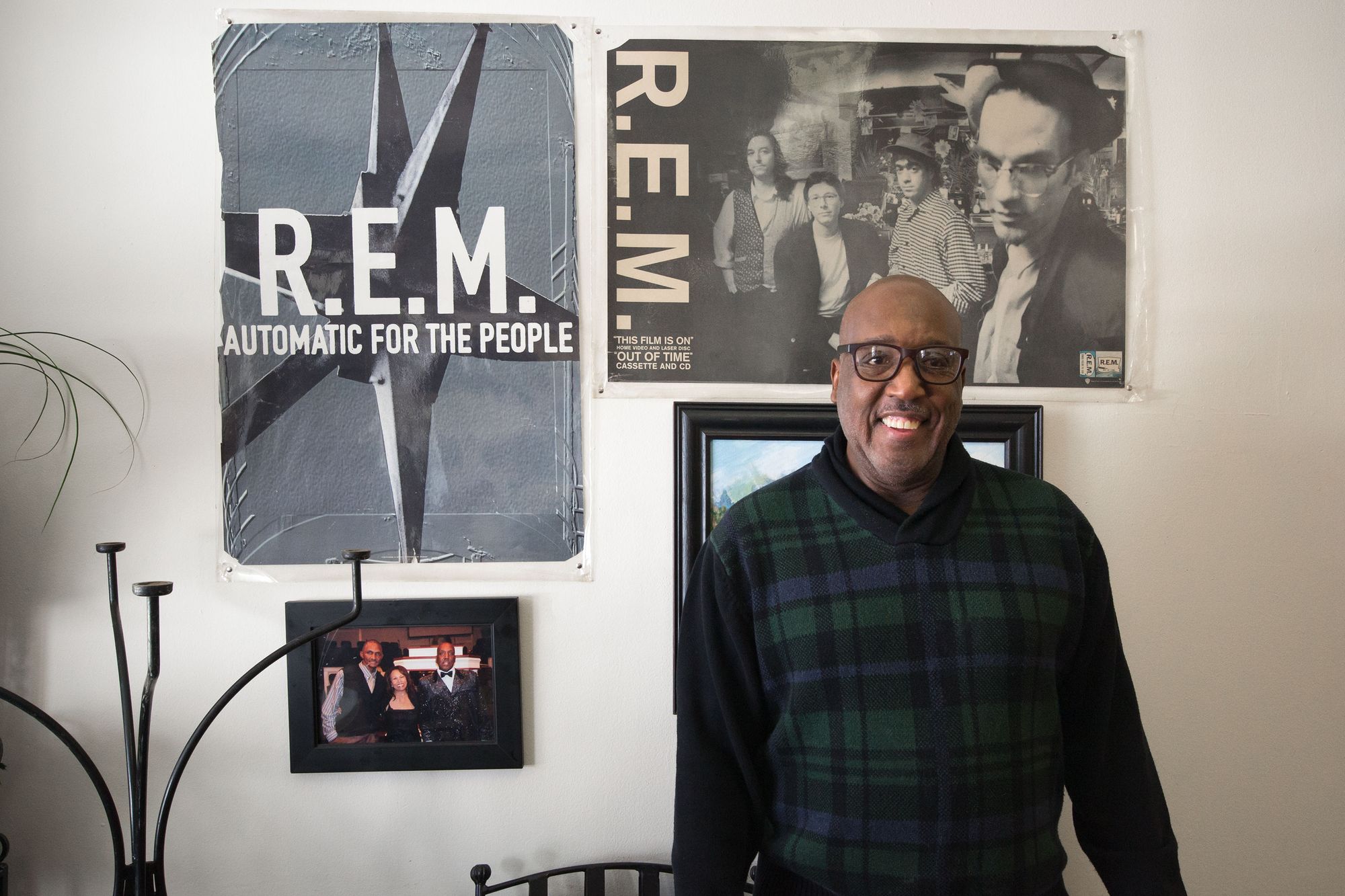 Dexter Weaver in front of the R.E.M. album cover.