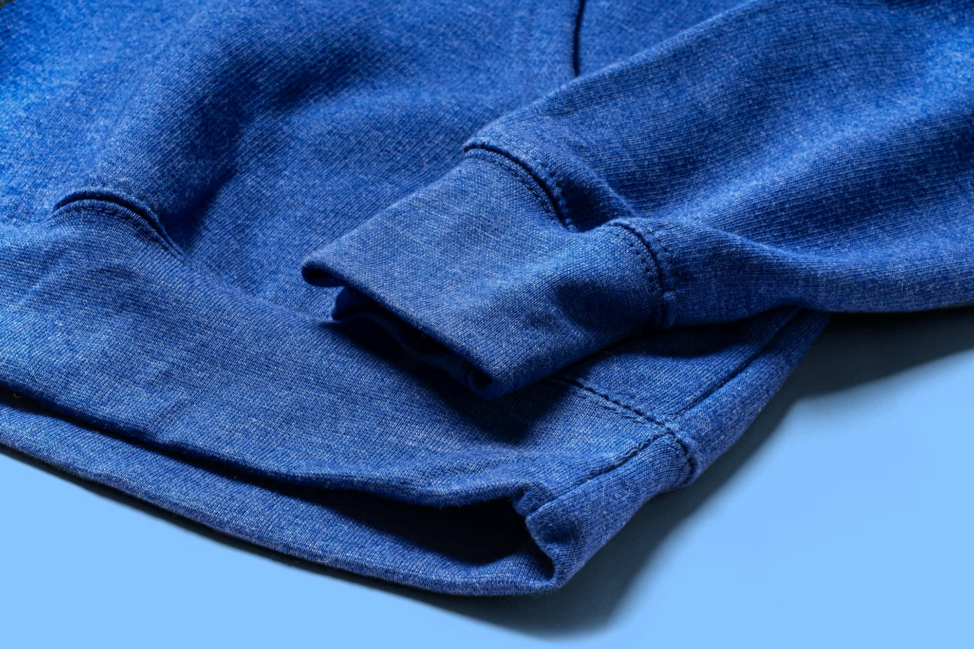 Detail of the bottom hem of the Independent Trading Pullover Hoodie.