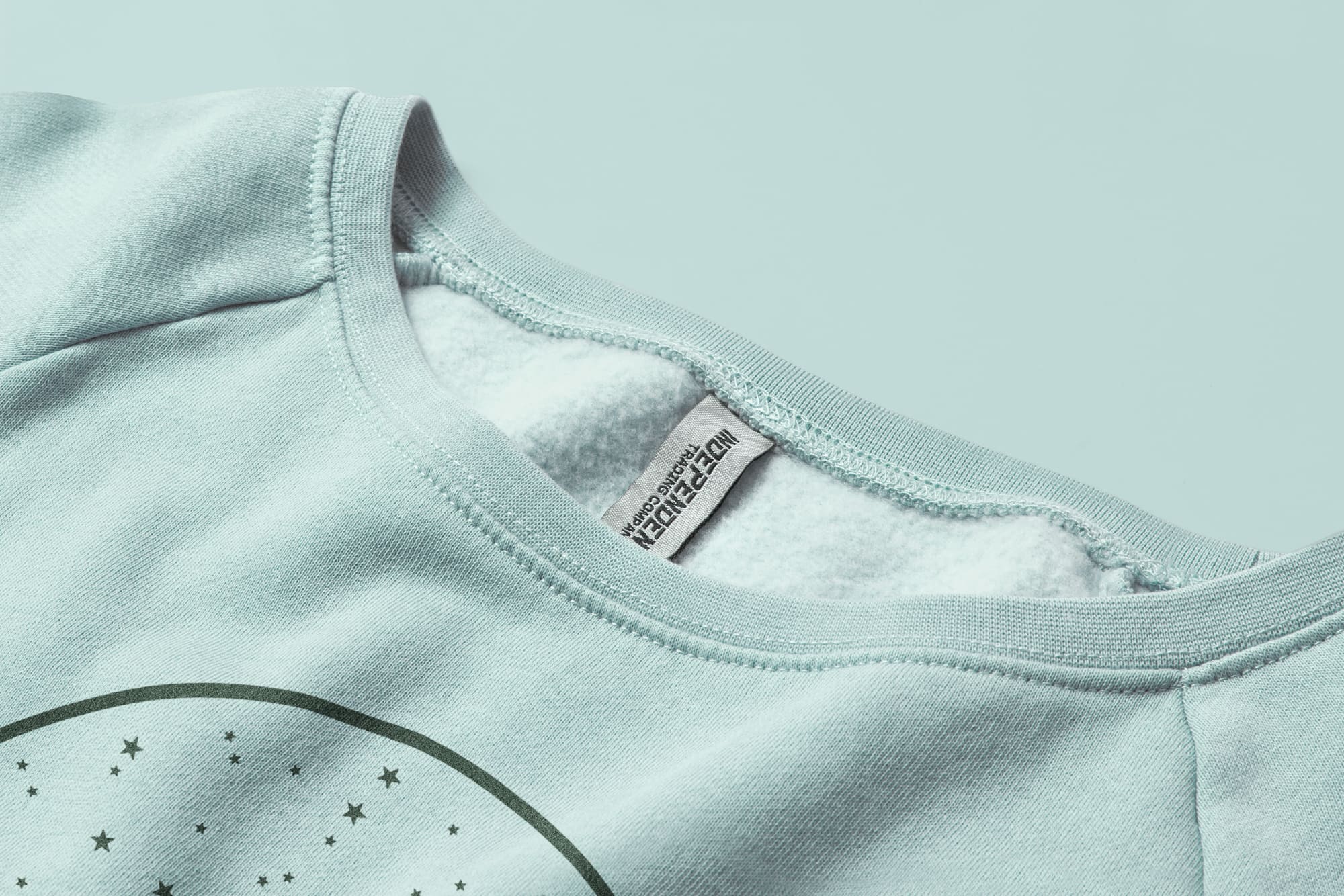 Detail of the collar of the Independent Trading Ladies Wave Wash Fleece Sweatshirt.