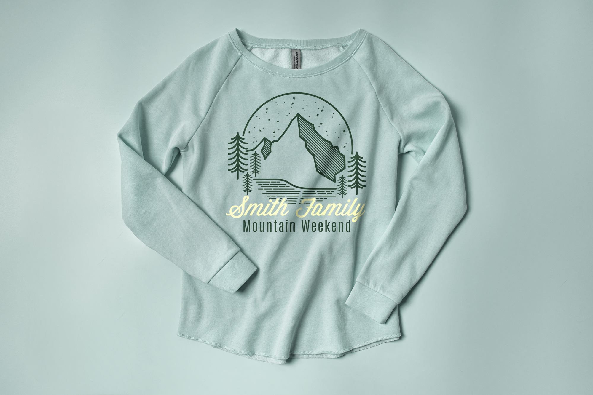 Flatlay of the Independent Trading Ladies Wave Wash Fleece Sweatshirt showing a custom family vacation design.