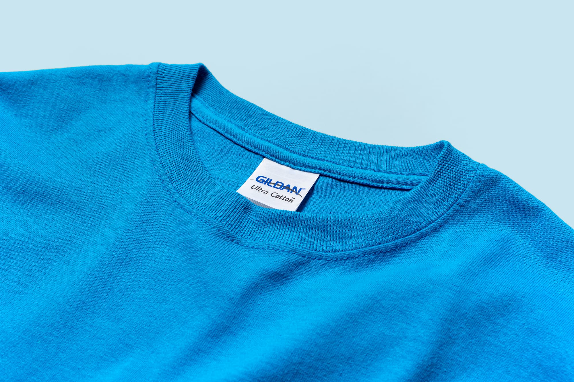 Detail image of the collar and tag of the Gildan Ultra Cotton Tee.