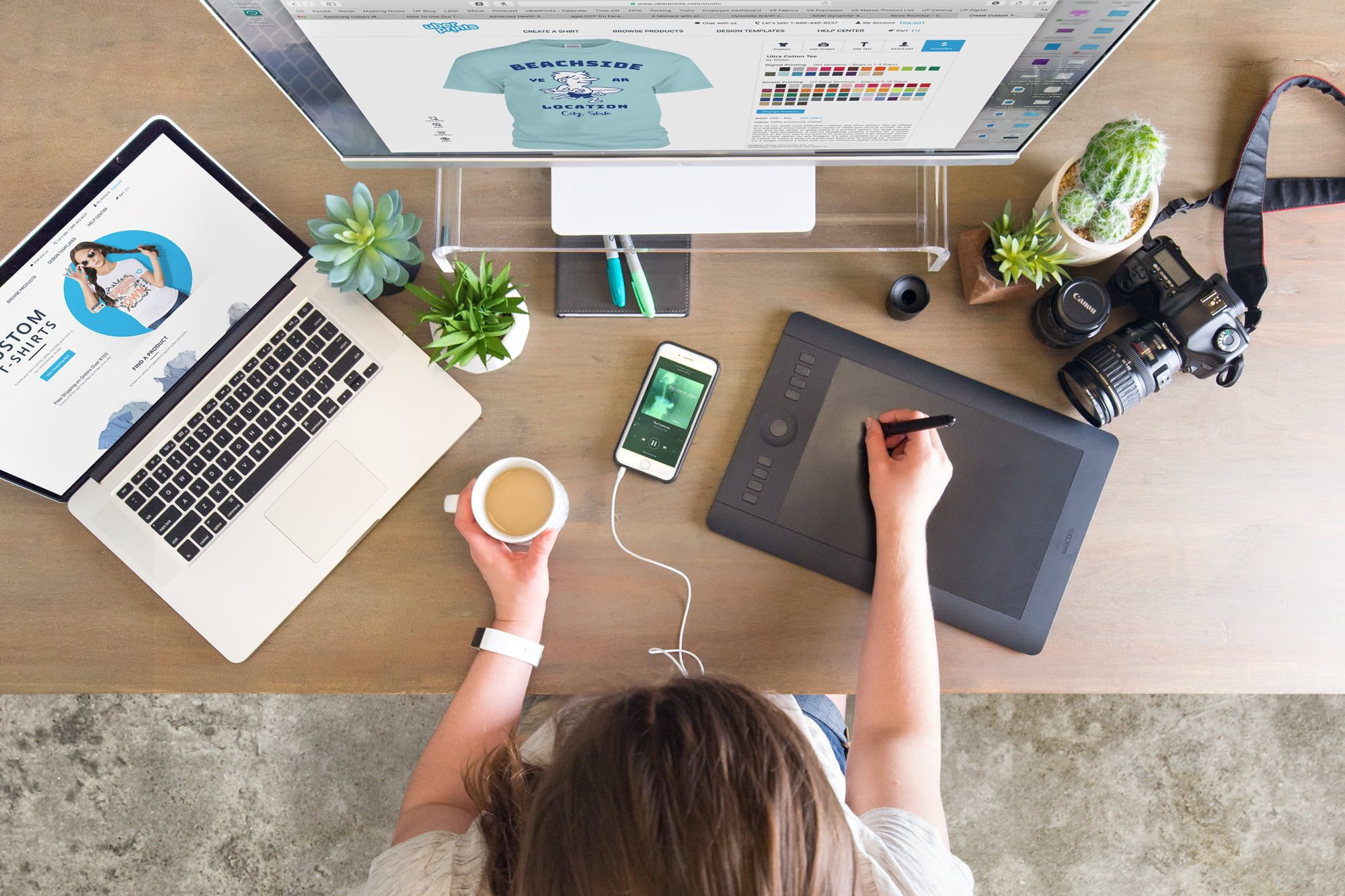 Overhead view of one of our designers and their desk.