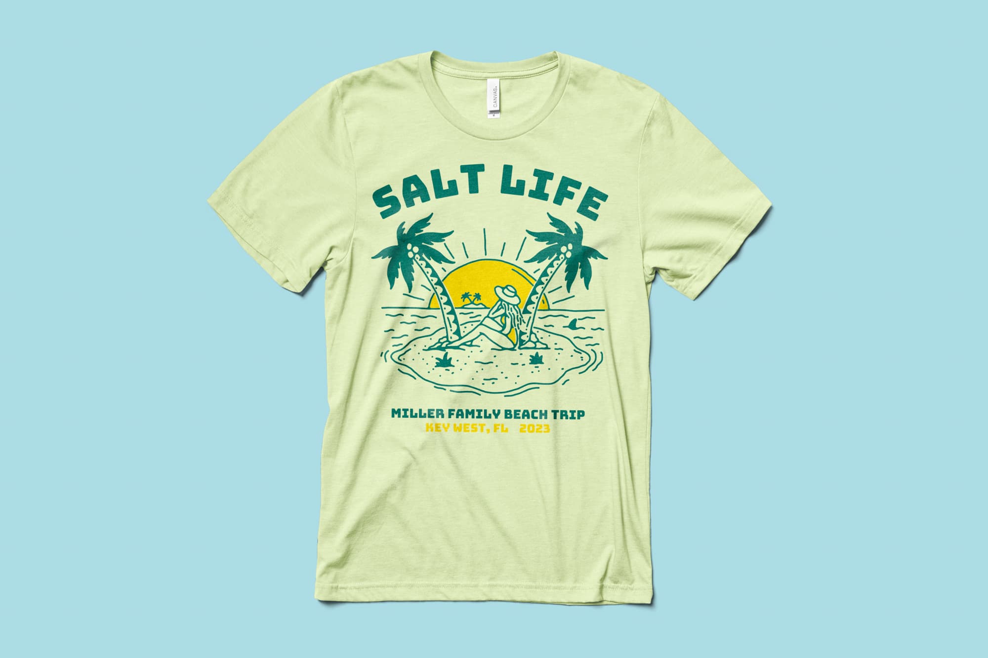 flatlay of a custom vacation t-shirt for a family trip to the beach.
