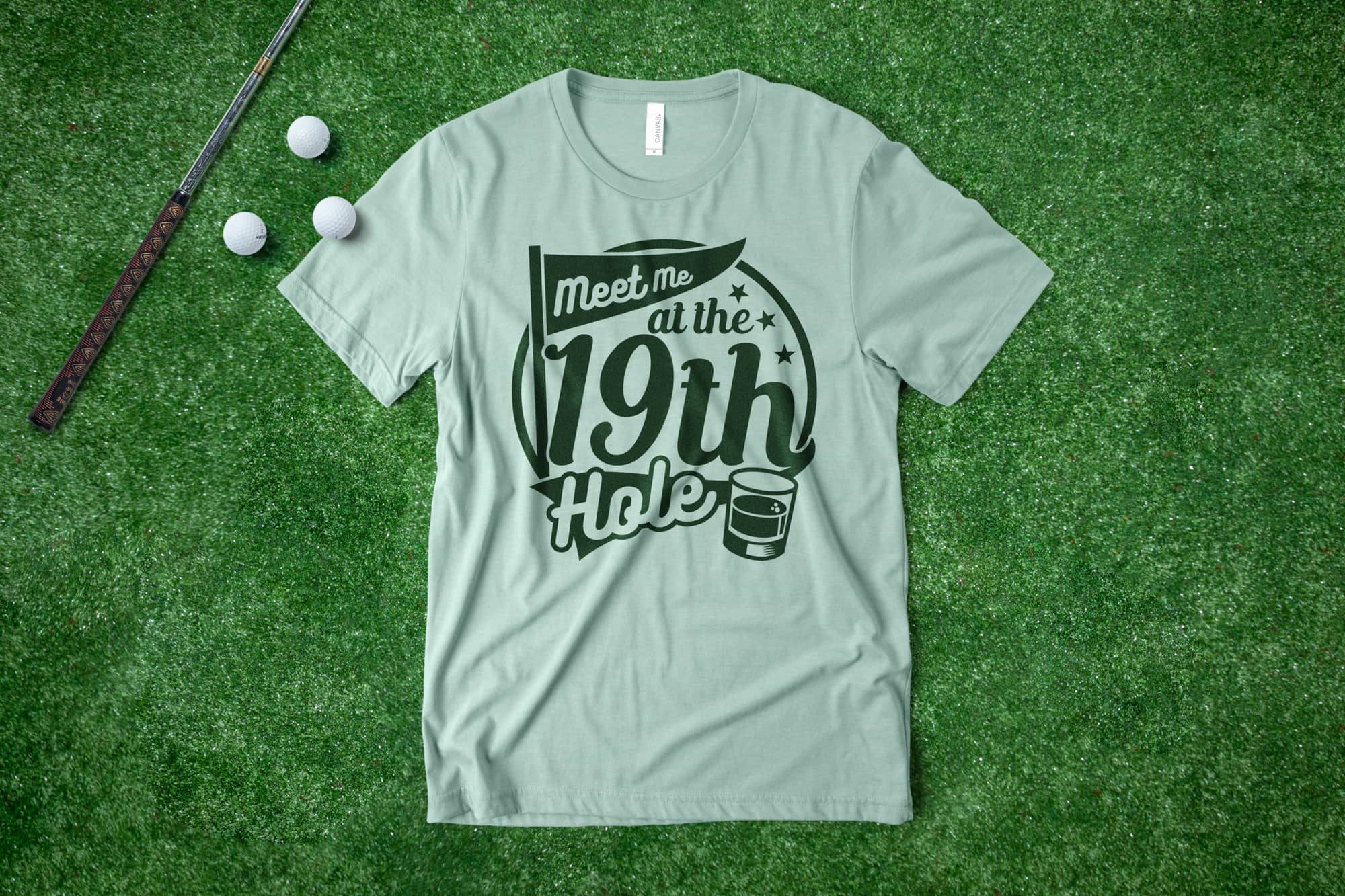 Flatlay on grass of a custom golf t-shirt with a funny design