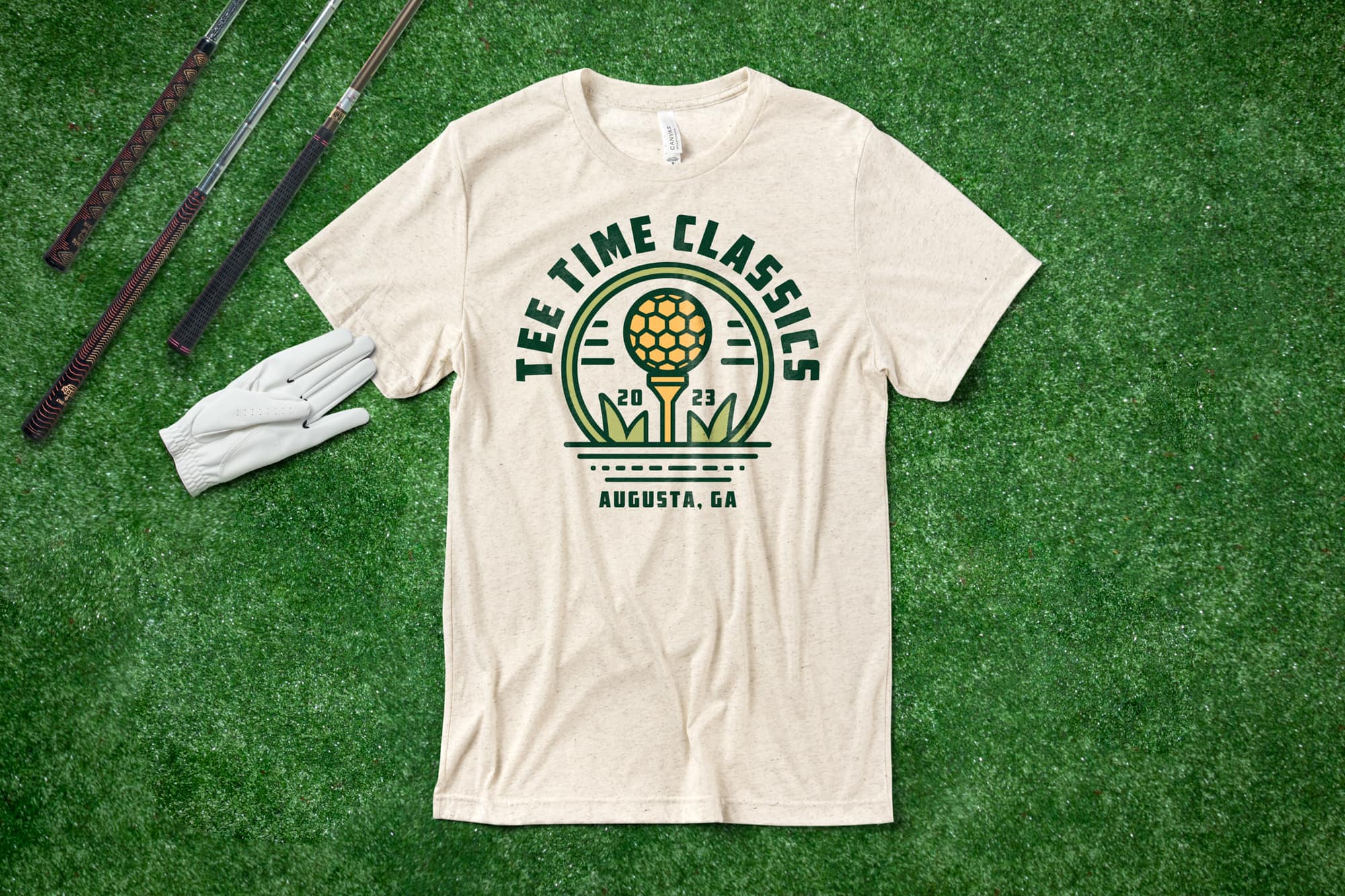 Flatlay on grass of a custom golf t-shirt with a monoline design
