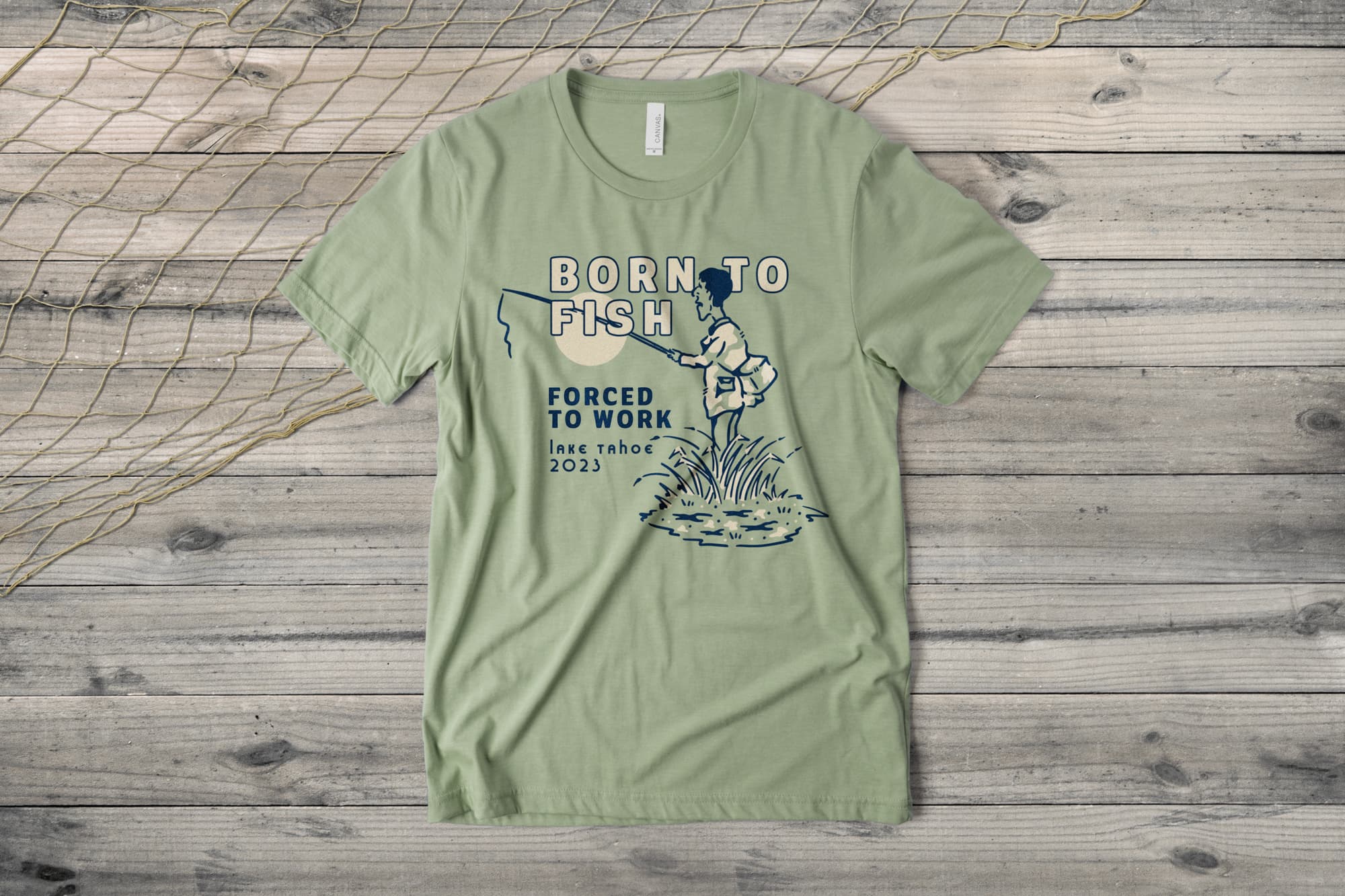 Custom t-shirt with a fishing themed template on the shirt. It says "Born to Fish, Forced to work. Lake Tahoe, 2023"