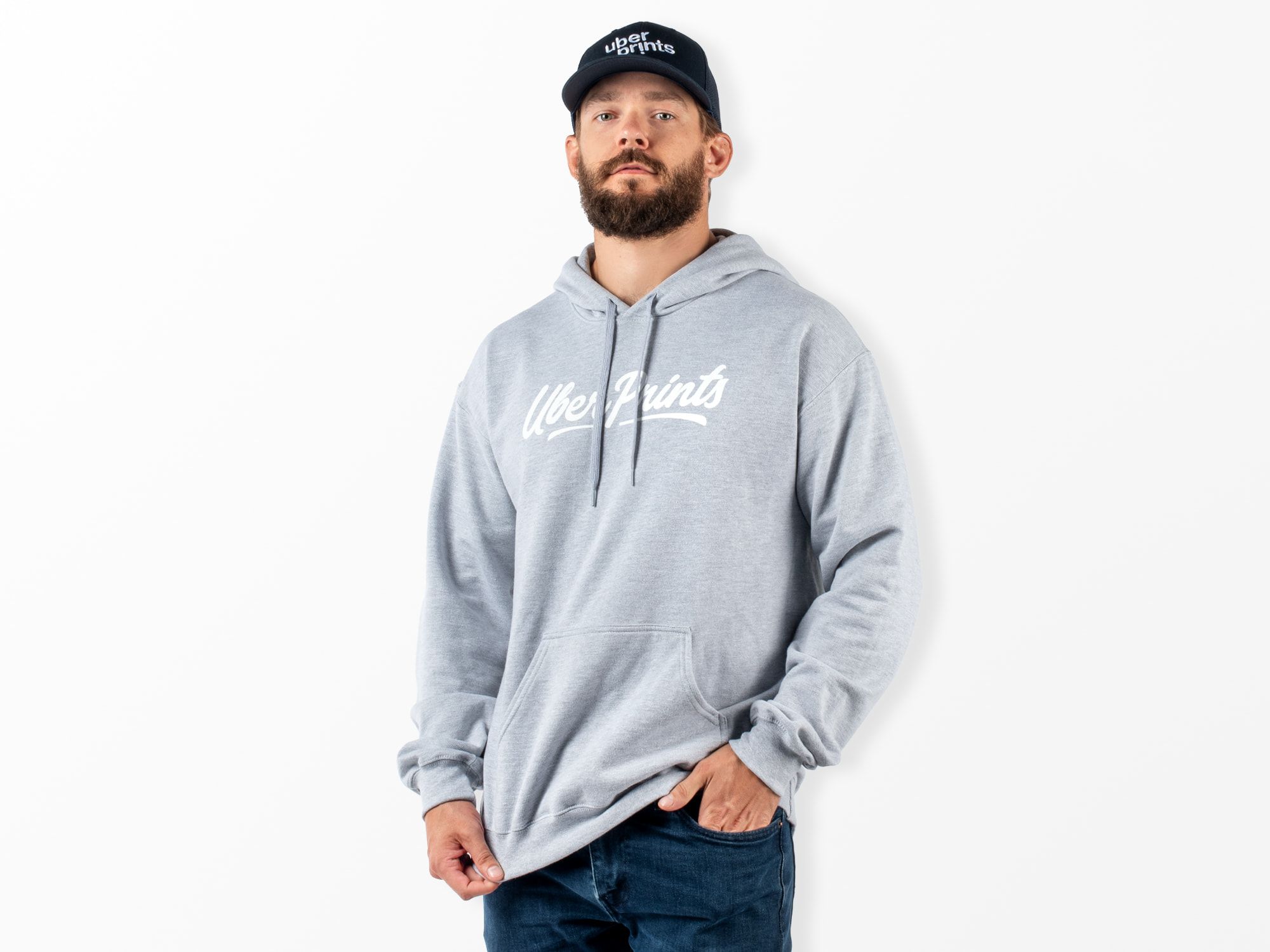 A male model wearing the Basic Hoodie to show fit.