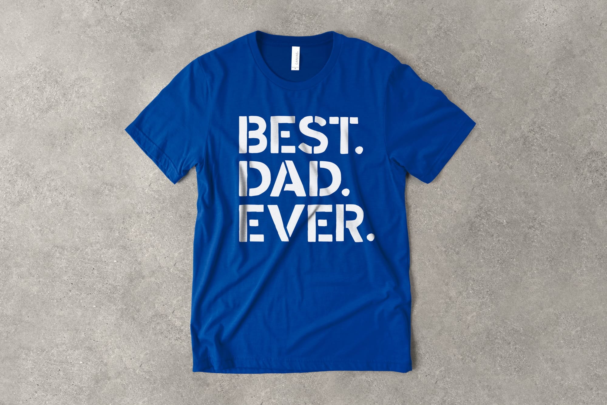 A flat t-shirt that has a customizable design that says "Best. Dad. Ever."
