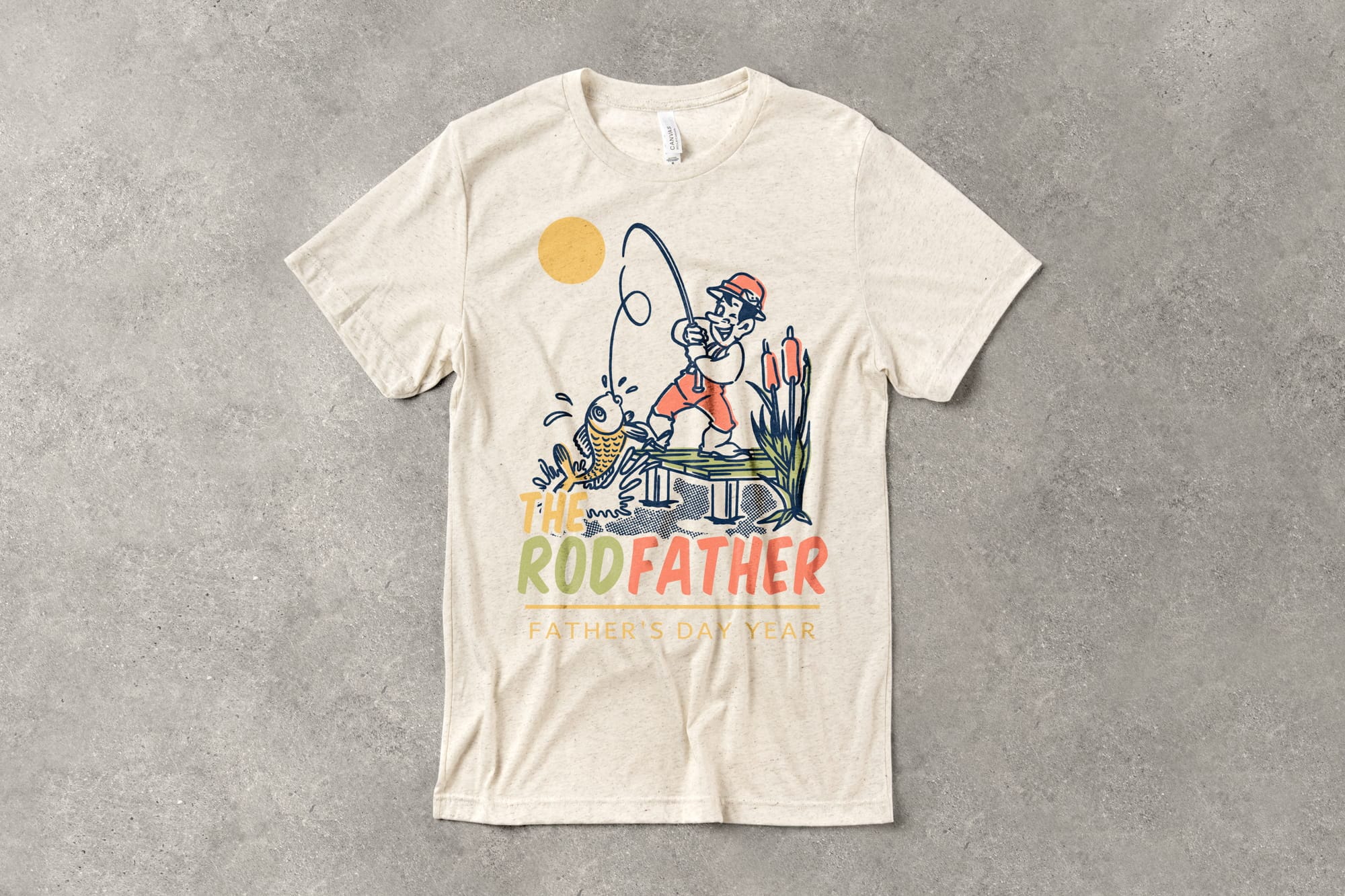 A flat t-shirt that has a customizable design that says "the rod father" and features a cartoon character catching a fish.