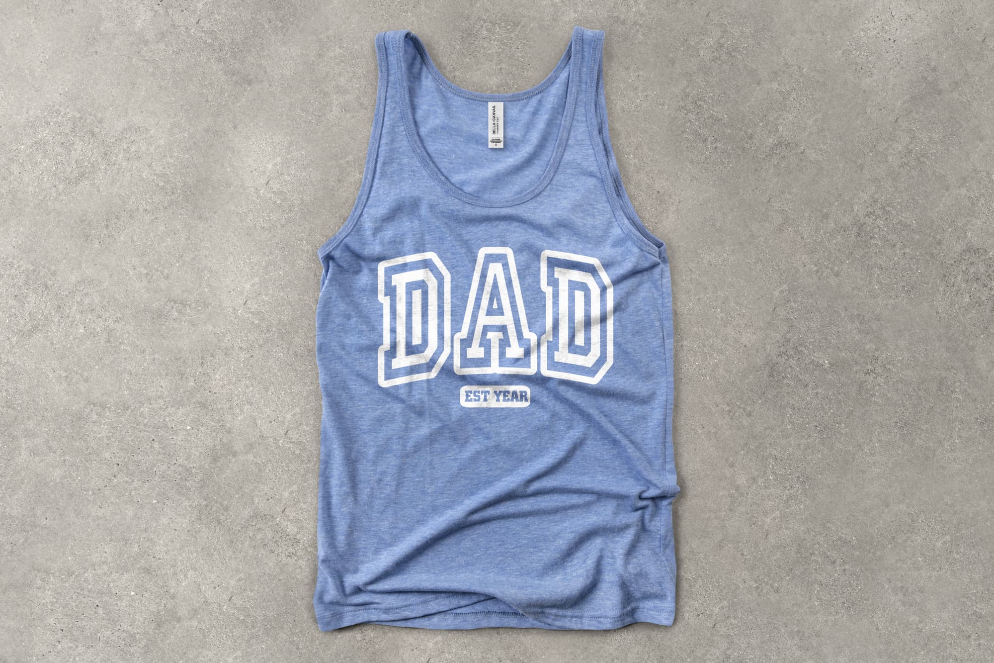 A flat tank top shirt that has a simple customizable design that says "Dad - est year" in all caps.