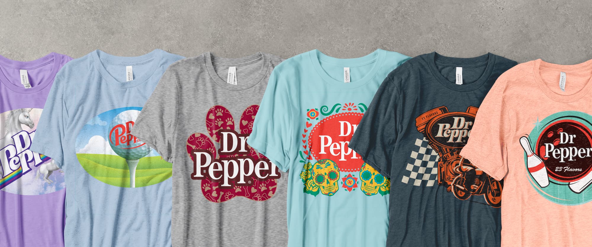 Lineup of shirts that each have a different Dr Pepper design.