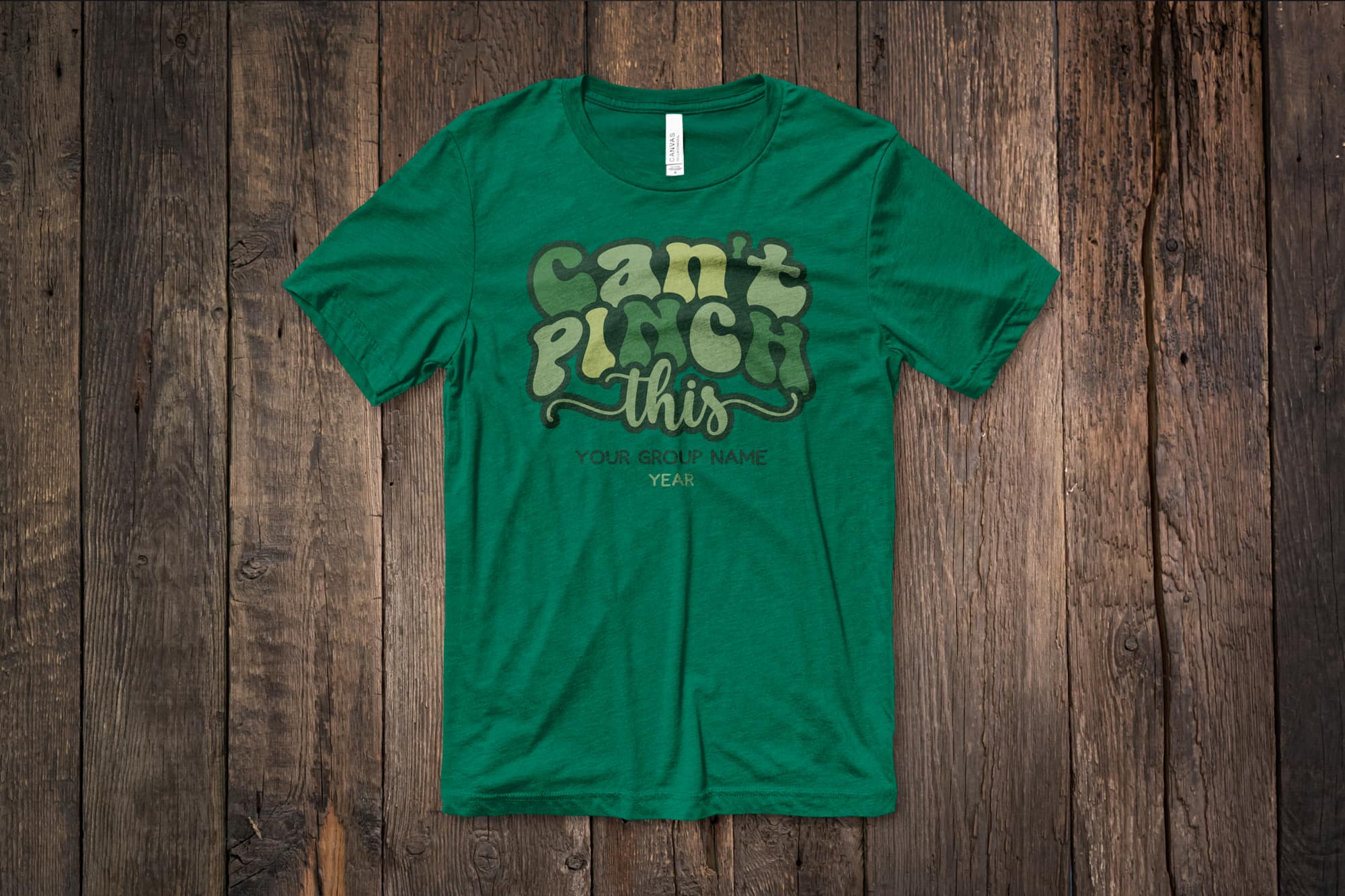 image of a flat green shirt with a customizable st. Patrick day design that says "can't pinch this"