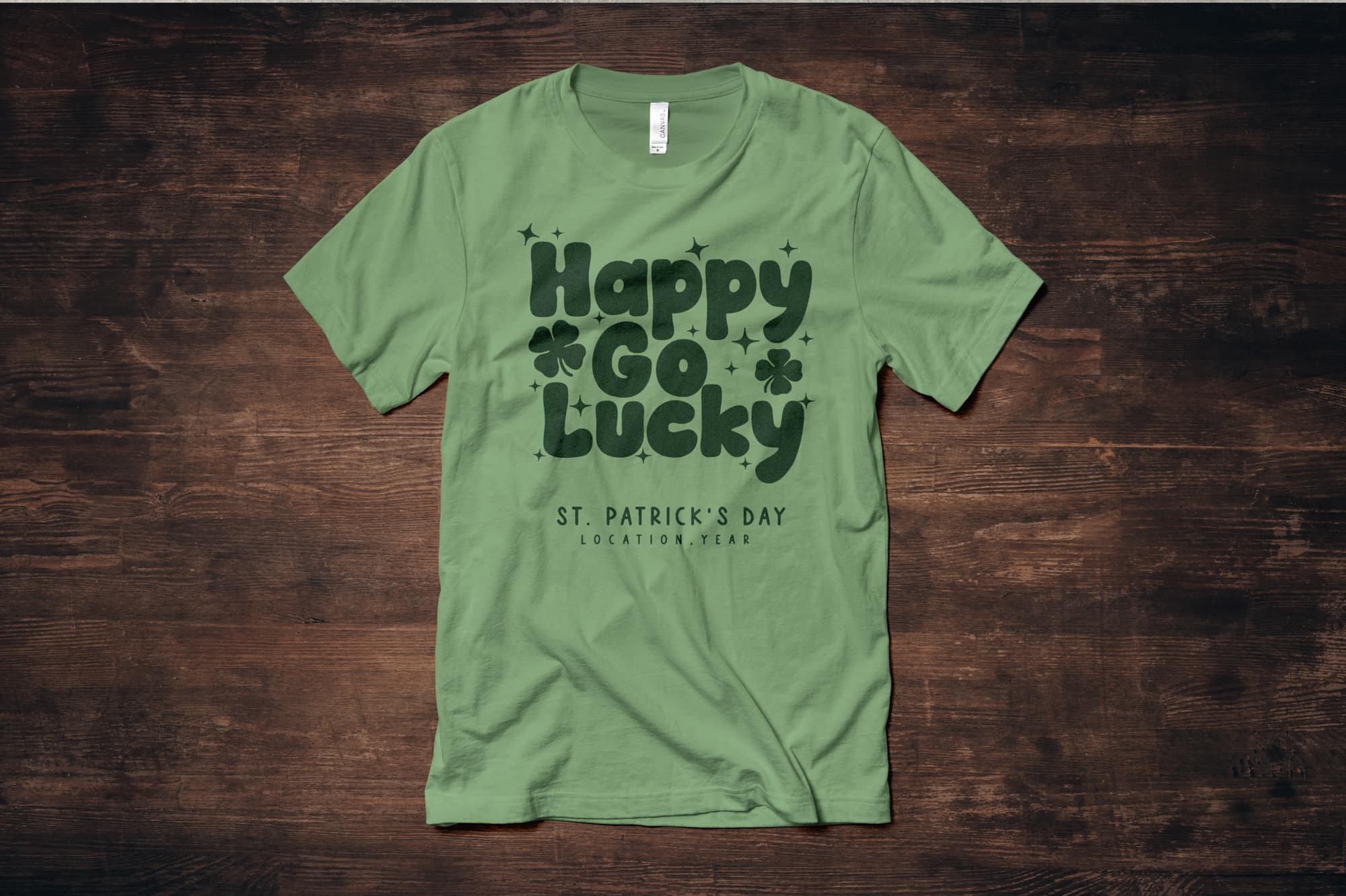 image of a flat green shirt with a customizable st. Patrick day design that says "happy go lucky"