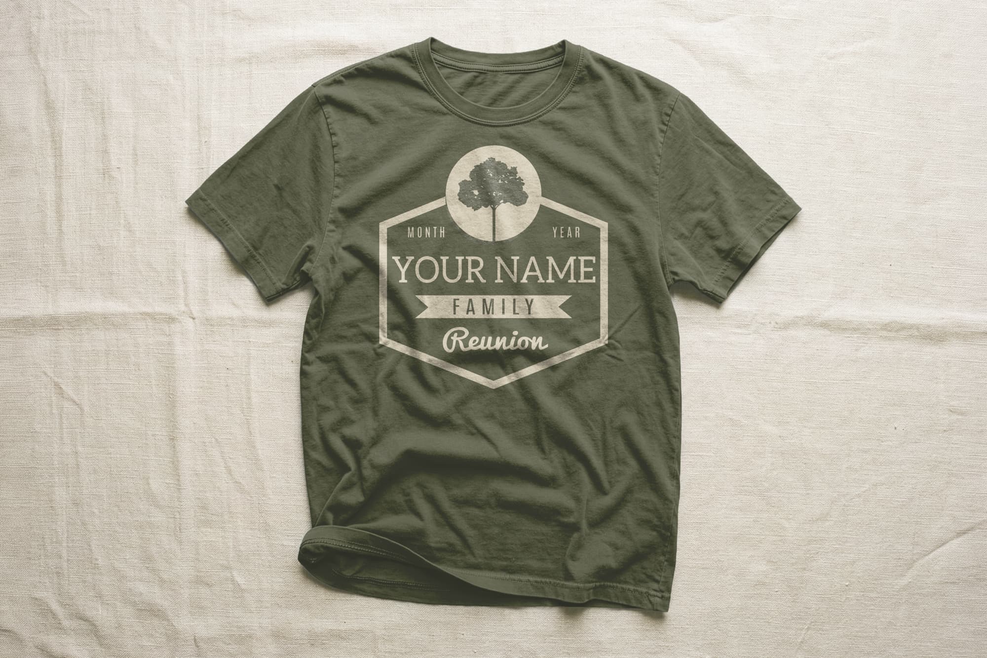 Green t-shirt with a family reunion design featuring a tree icon. Text placeholders for "Month," "Year," and "Your Name" add a personal touch. Casual tone.